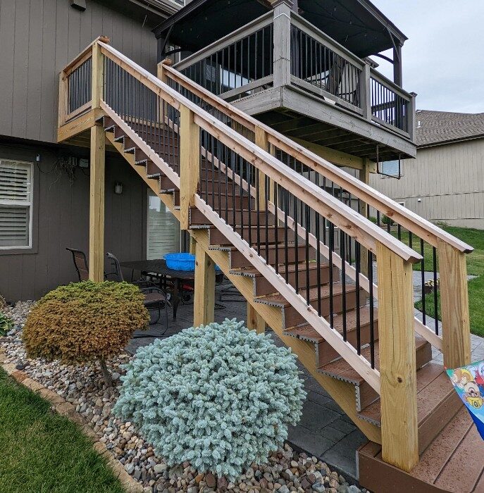 Two-story deck with new stairs and railings
